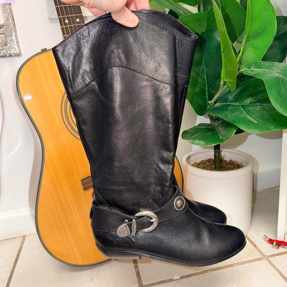 Black leather knee high boots with